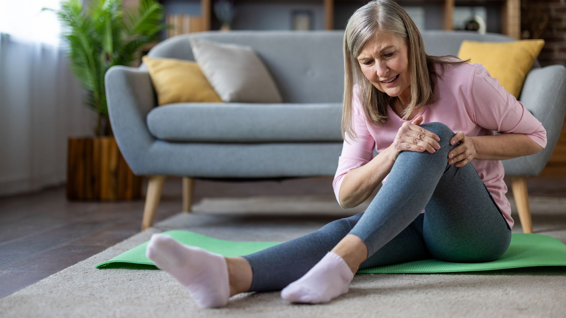 woman doing yoga with bad knees.j