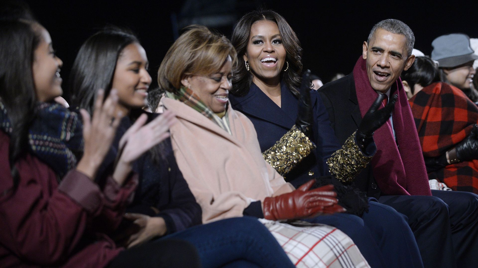 Michelle Obama with husband Barack and their daughters