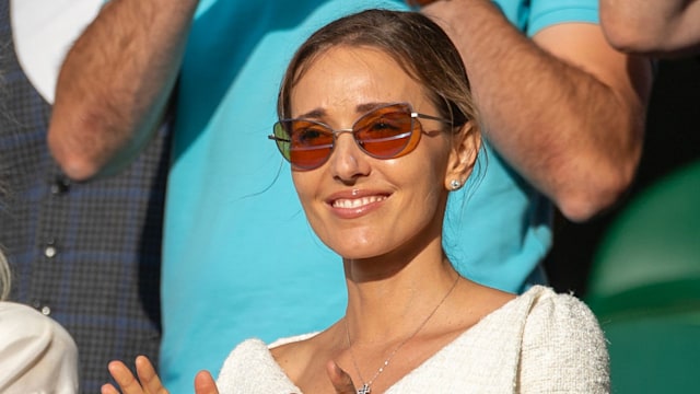 Jelena Djokovic, wife of Novak Djokovic of Serbia shows her support as he receives his runners-up trophy at the presentation ceremony after his five-set loss against Carlos Alcaraz of Spain in the Gentlemen's Singles Final match on Centre Court during the Wimbledon Lawn Tennis Championships at the All England Lawn Tennis and Croquet Club