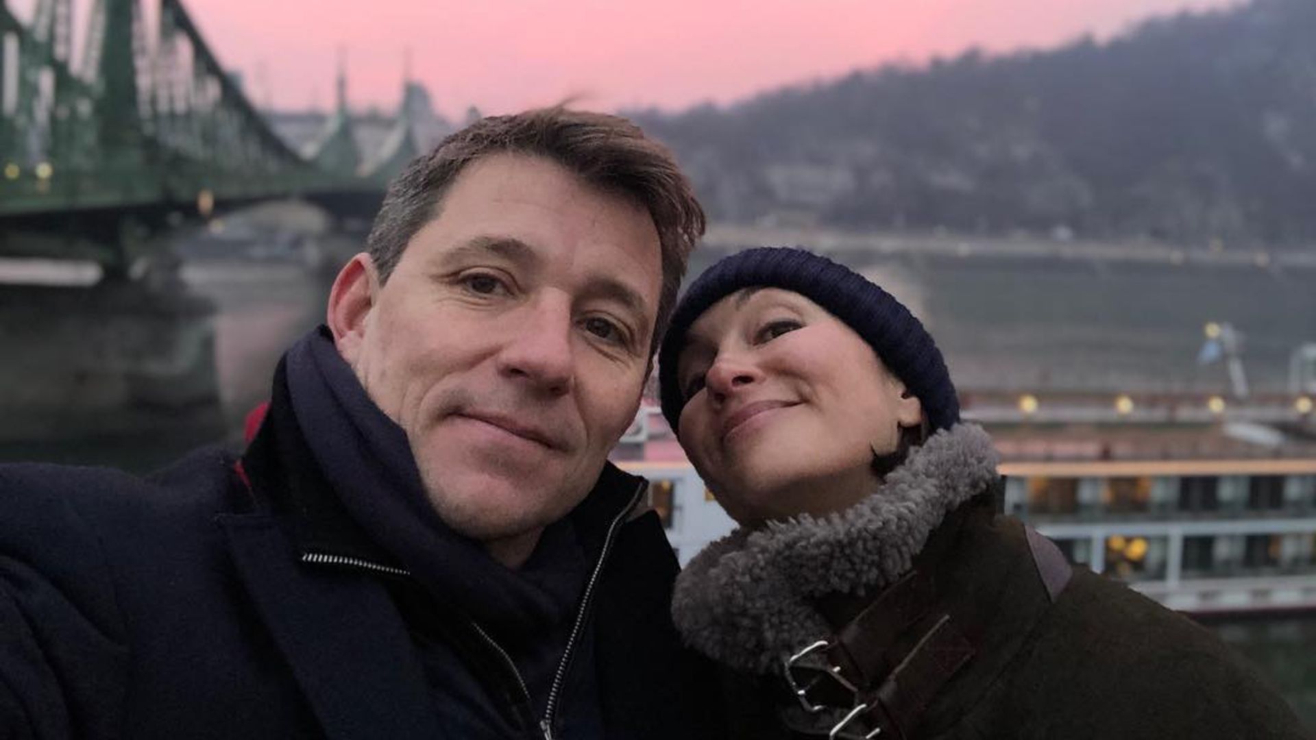 couple posing in budapest 