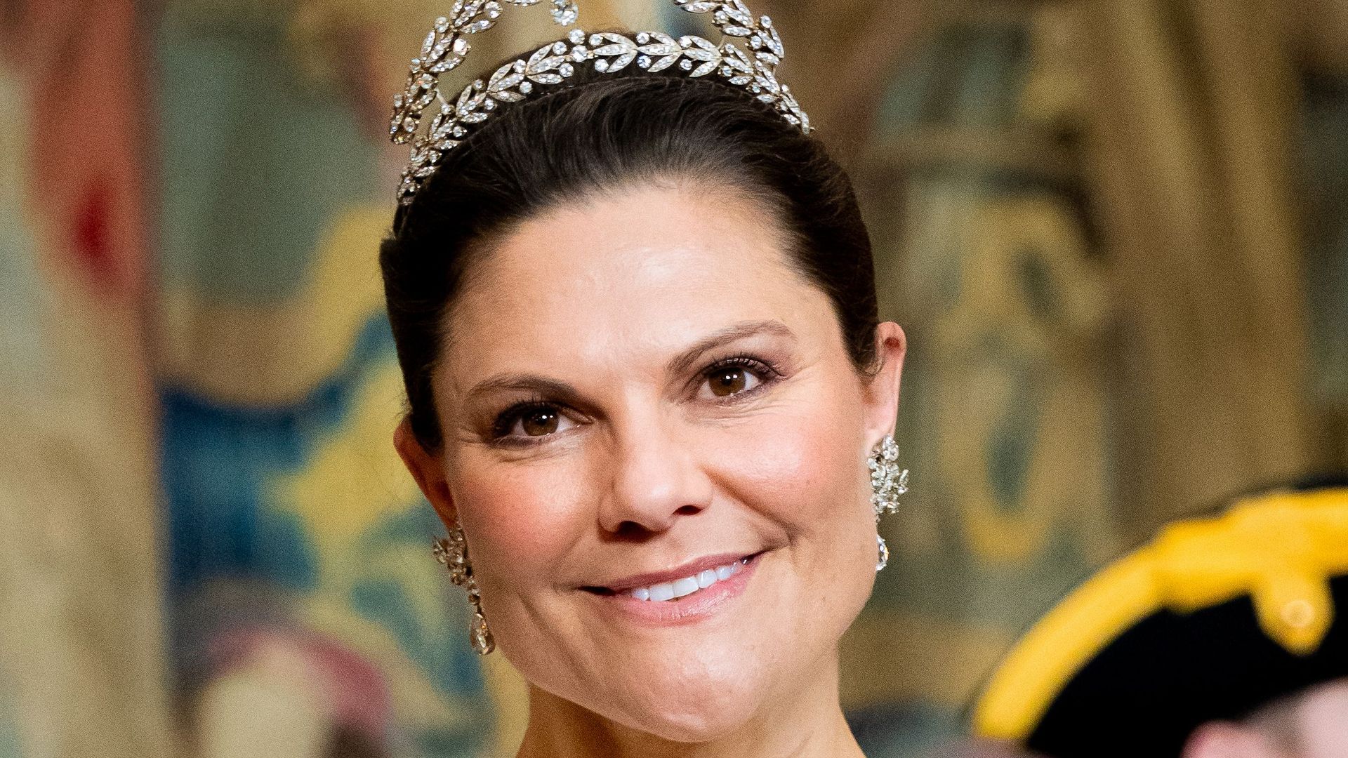 Crown Princess Victoria is picture-perfect in regal feathered look with heirloom tiara