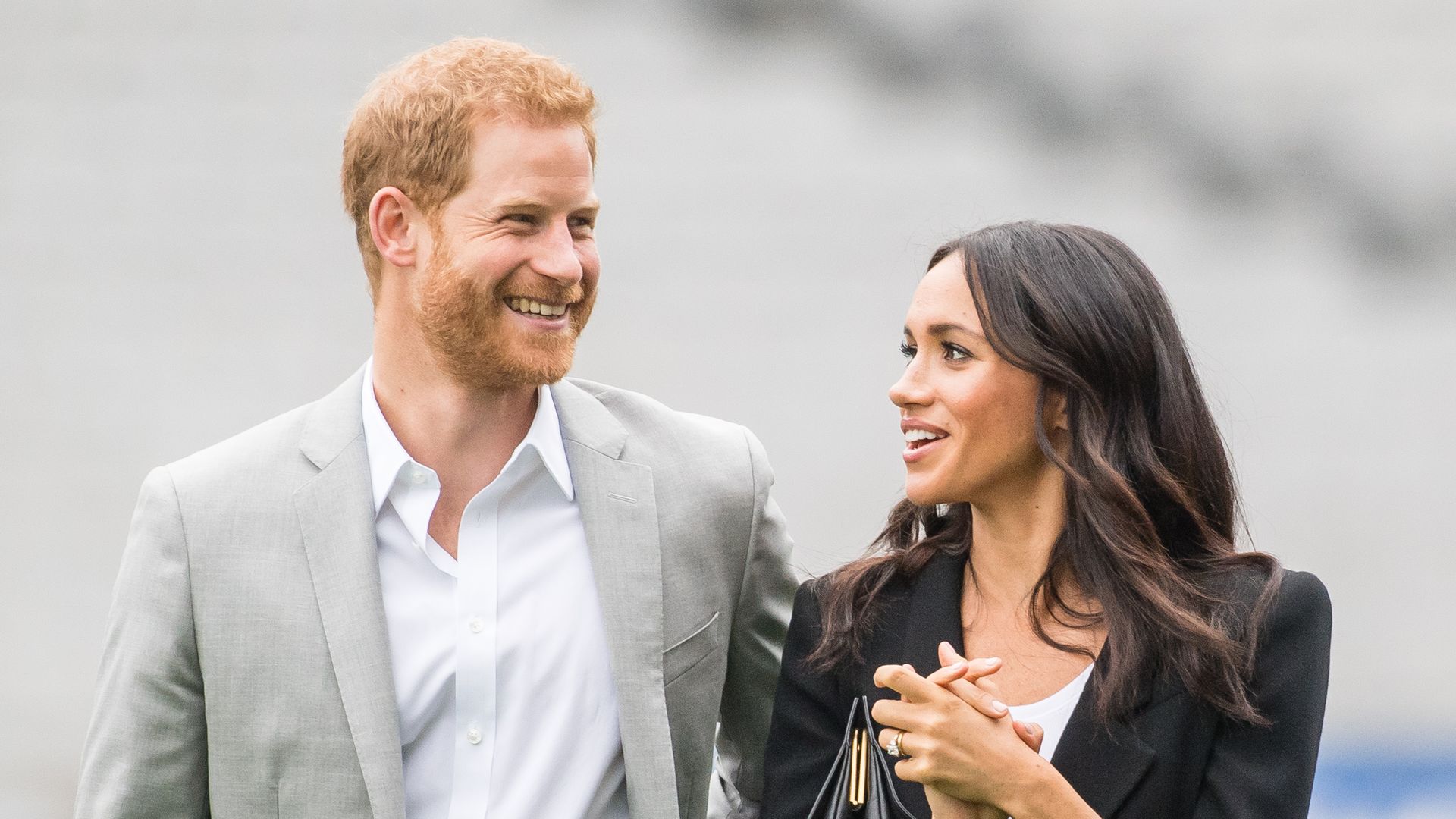 Meghan smiling at Harry in Ireland