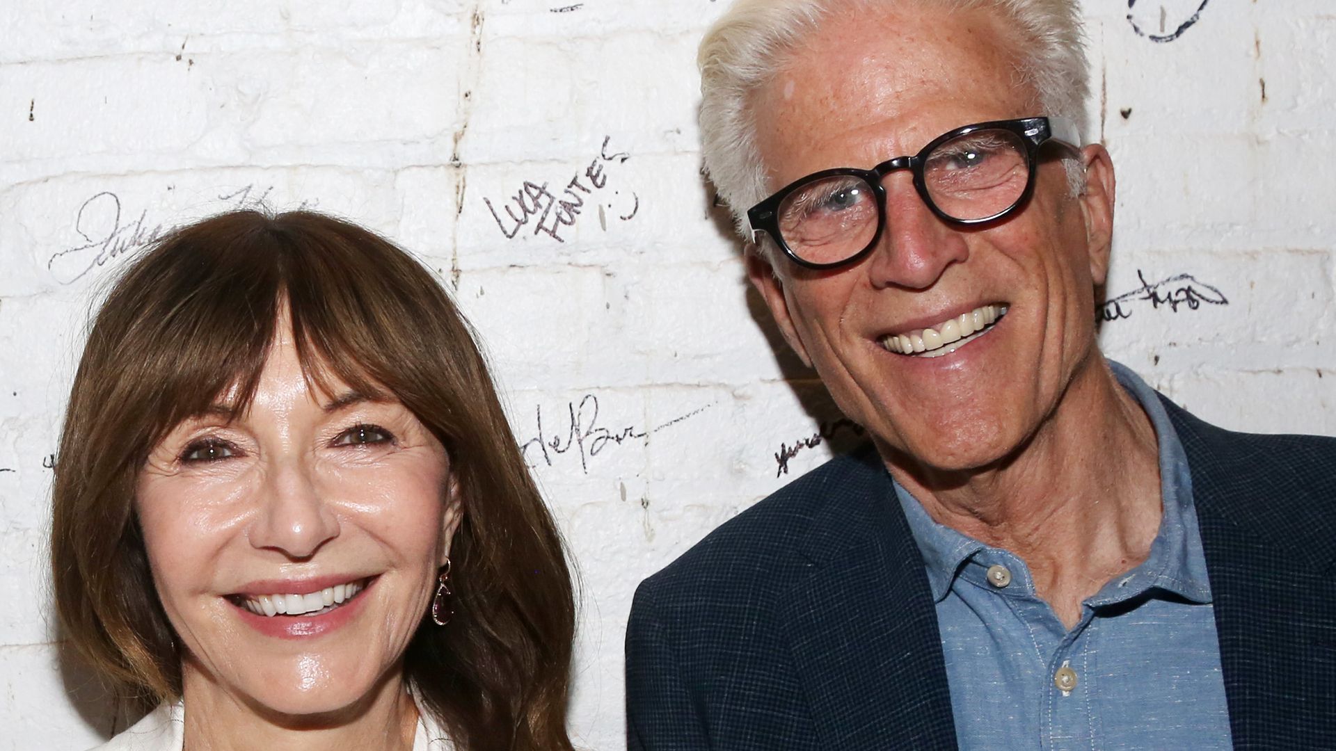 Ted Danson smiling with his wife Mary Steenburgen