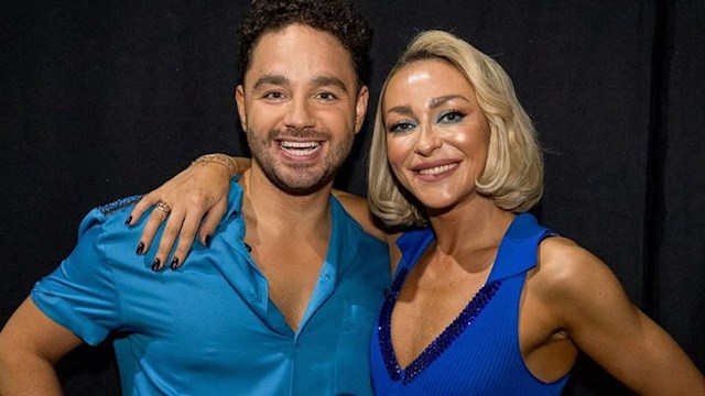 Adam Thomas with Luba in blue