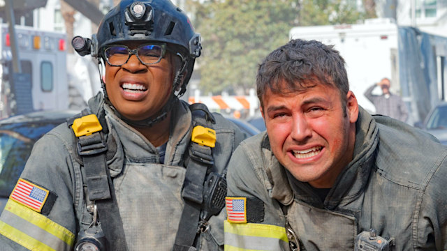 Aisha Hinds and Ryan Guzman as Hen and Eddie in 9-1-1