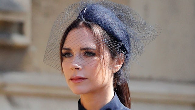 Victoria Beckham and David Beckham attend the wedding of Prince Harry to Ms Meghan Markle at St George's Chapel, Windsor Castle on May 19, 2018 in Windsor, England. 