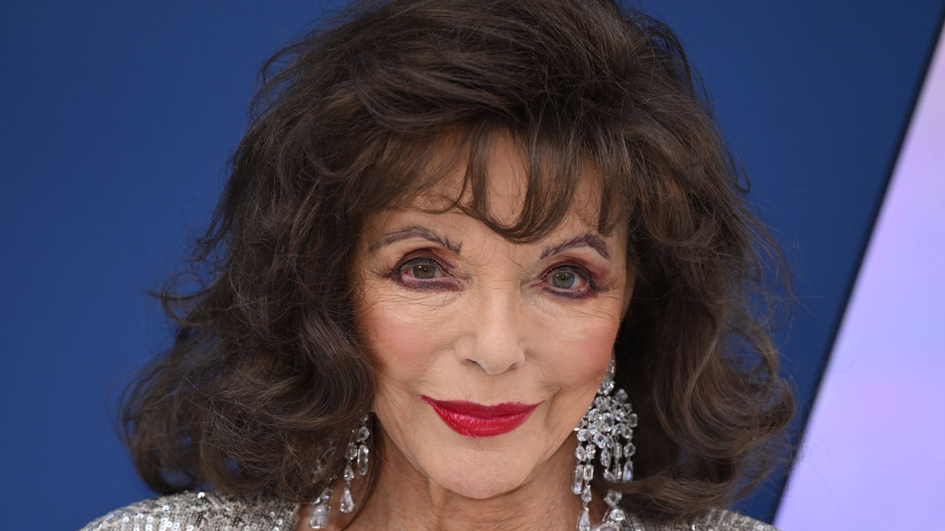Joan Collins has opened up about her excitement over reuniting with her half-siblings