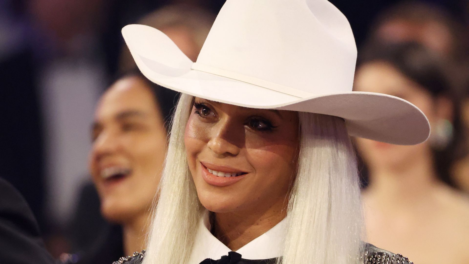 Beyonce looks sensational in double denim and cowboy hat