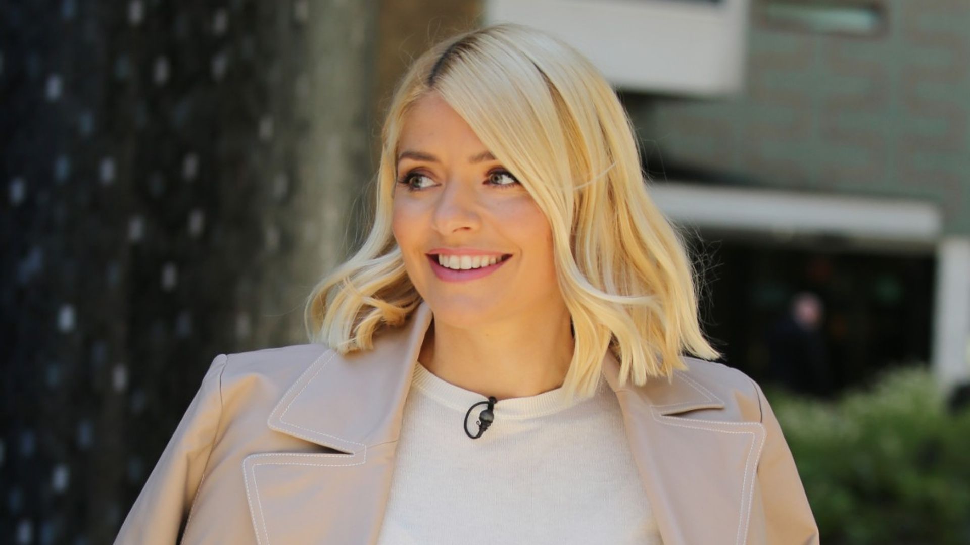 holly willoughby smiling camel overcoat