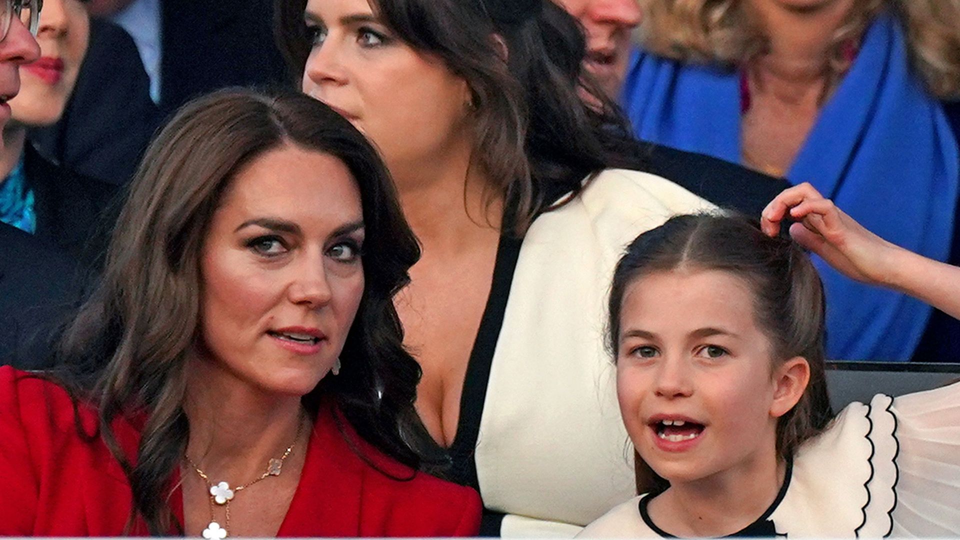 Britain's Catherine, Princess of Wales (L), and her daughter Britain's Princess Charlotte of Wales attend the Coronation Concert at Windsor Castle in Windsor, west of London on May 7, 2023.