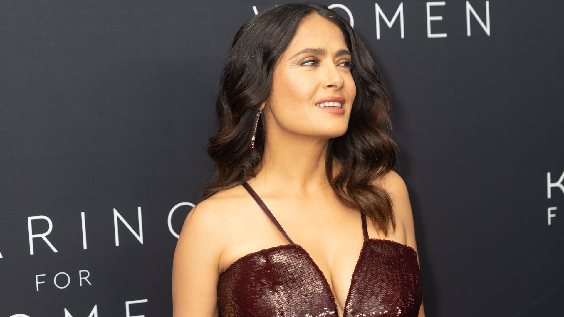 Salma Hayek in a burgundy sequin dress