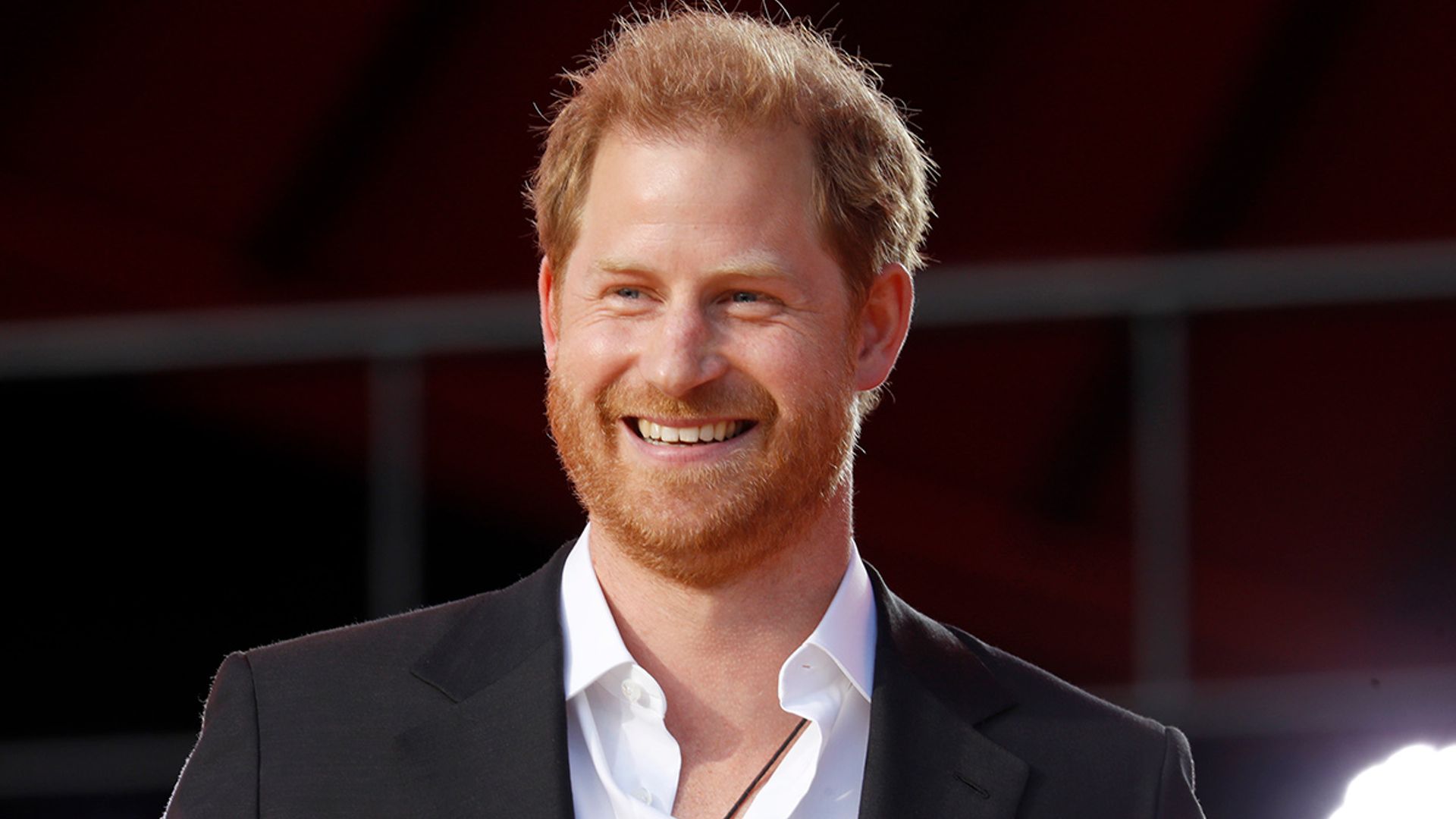 prince harry laughing suit