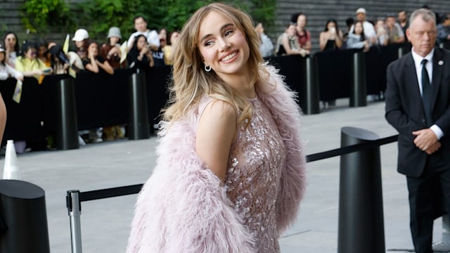 suki waterhouse in pink coat