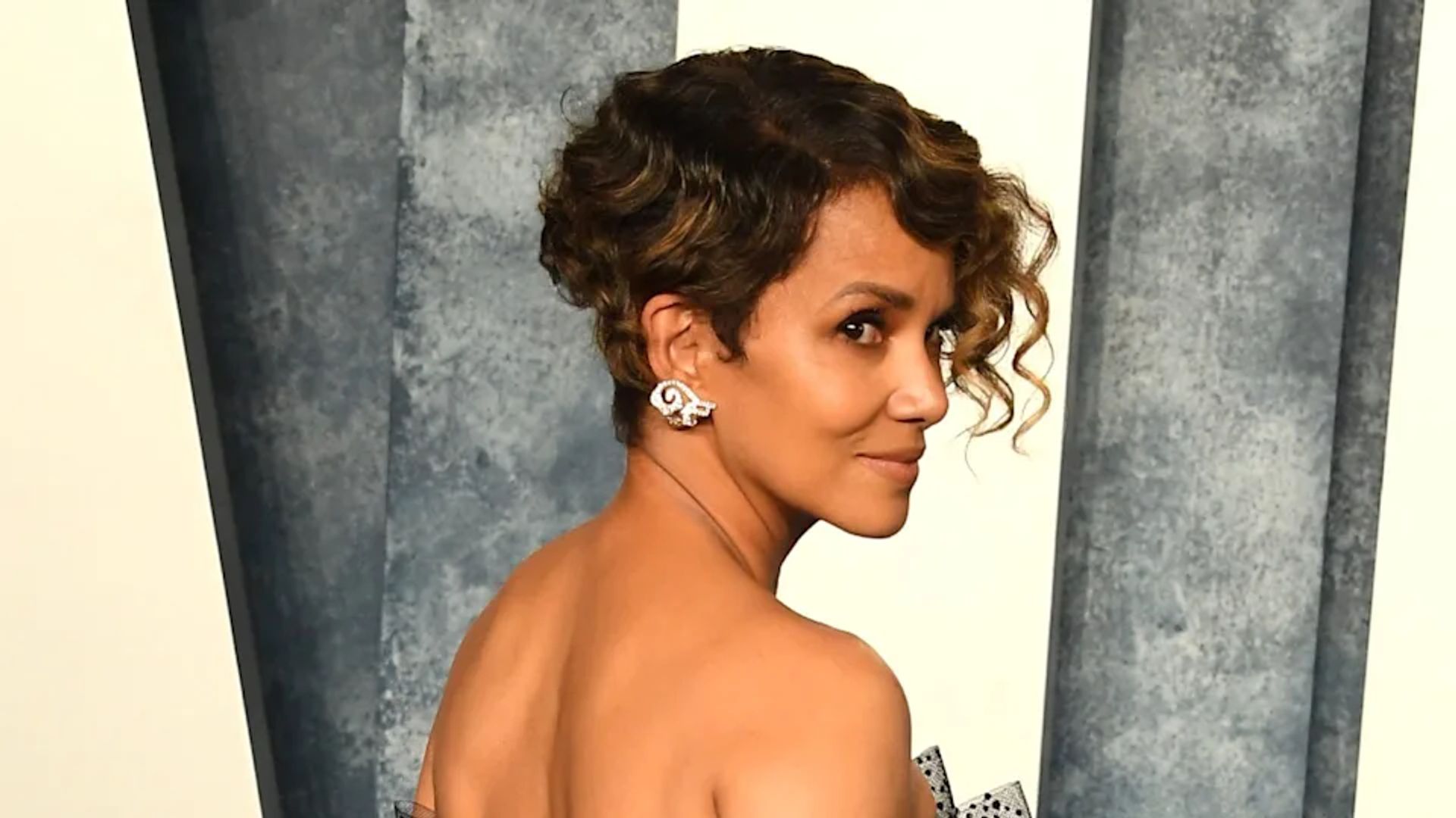 Halle Berry, 56, looks flawless as she poses for makeup free mirror selfie in lingerie