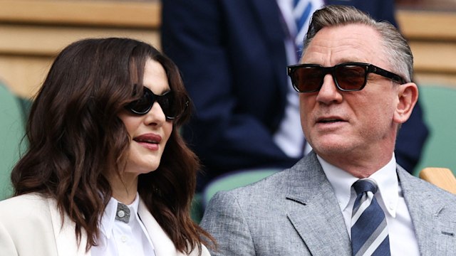 Daniel Craig and Rachel Weisz sitting in the royal box at Wimbledon