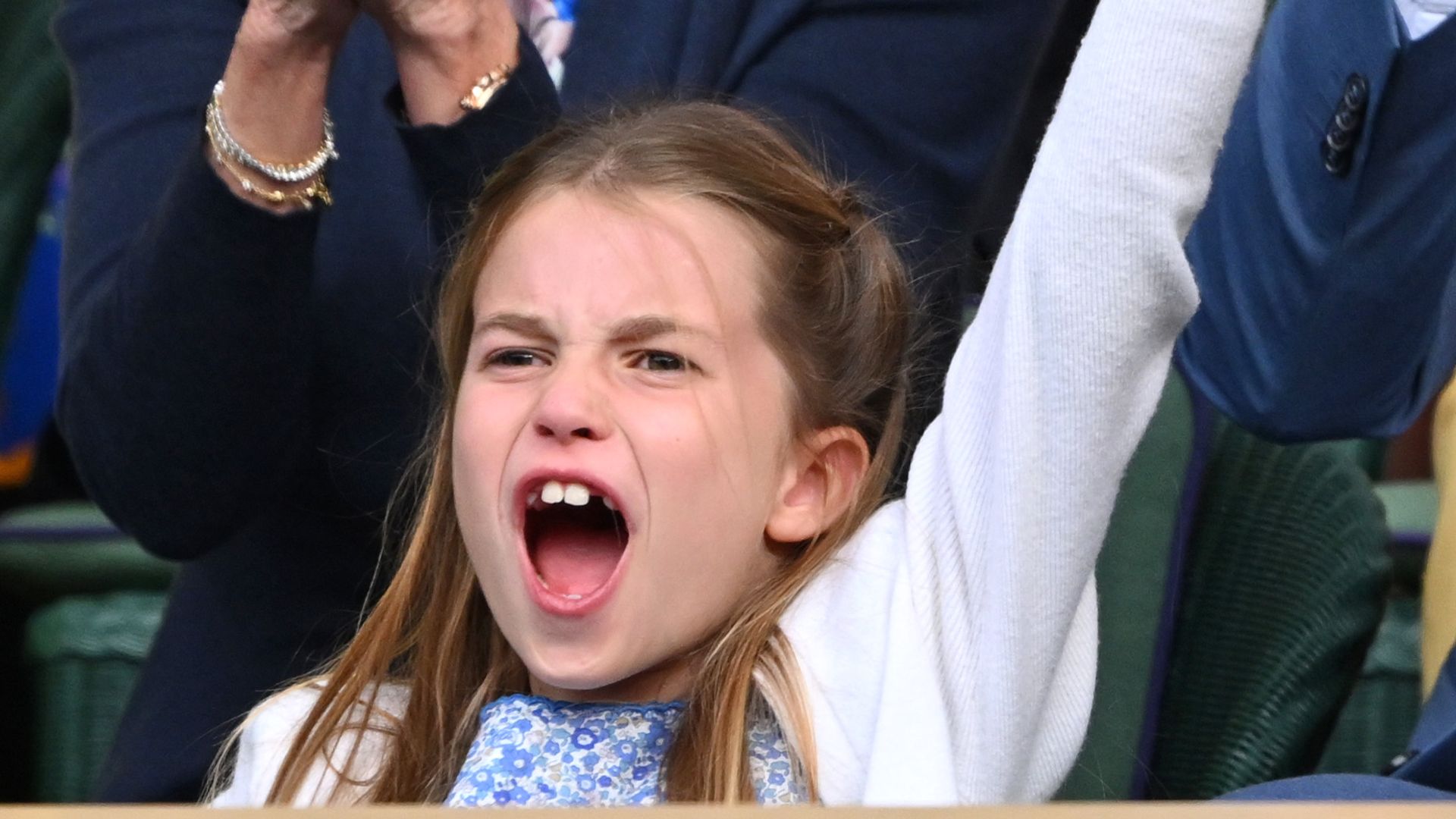 Chris Evert and Princess Charlotte of Wales cheering