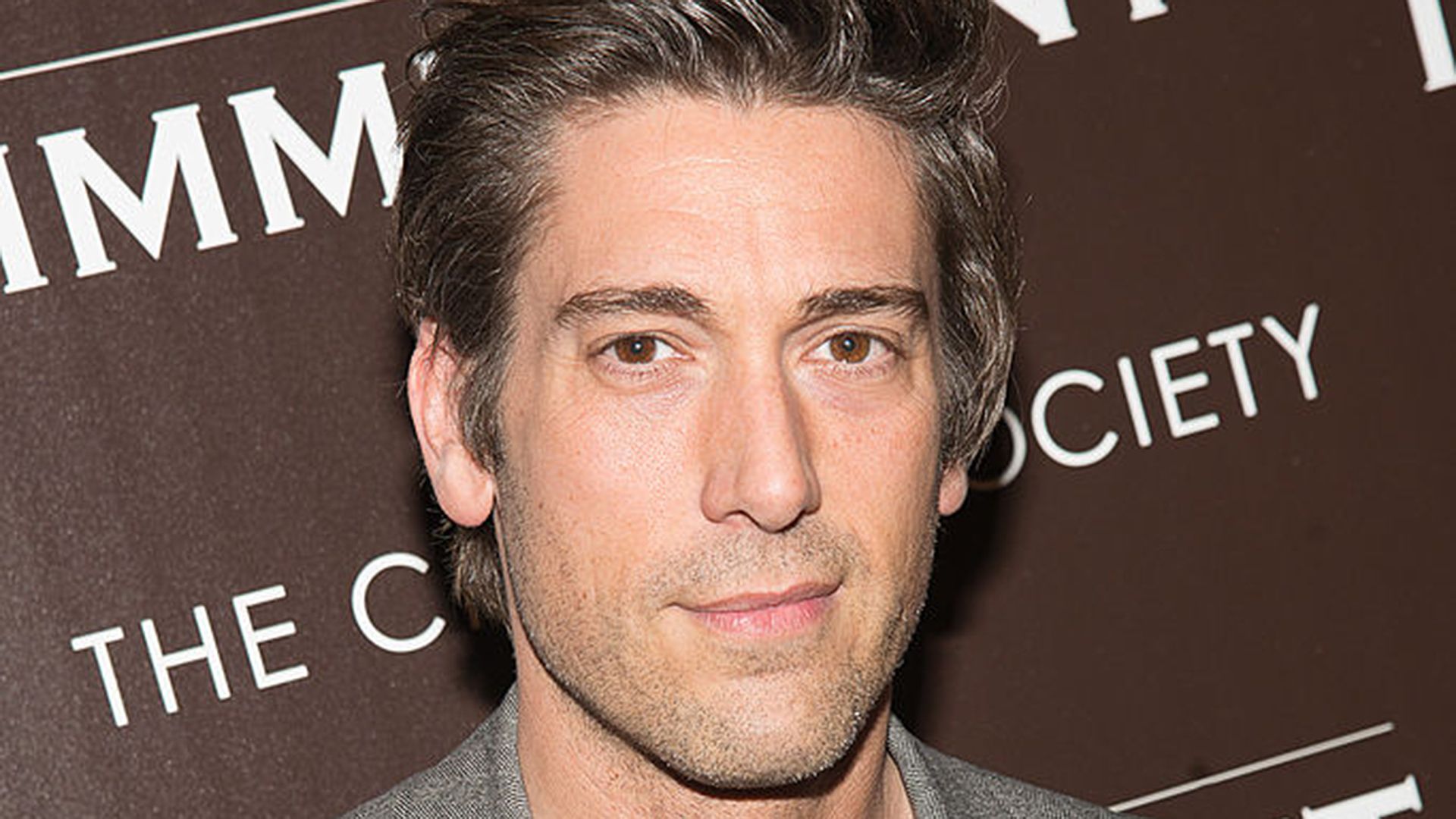 David Muir looks dashing as he makes rare public appearance for