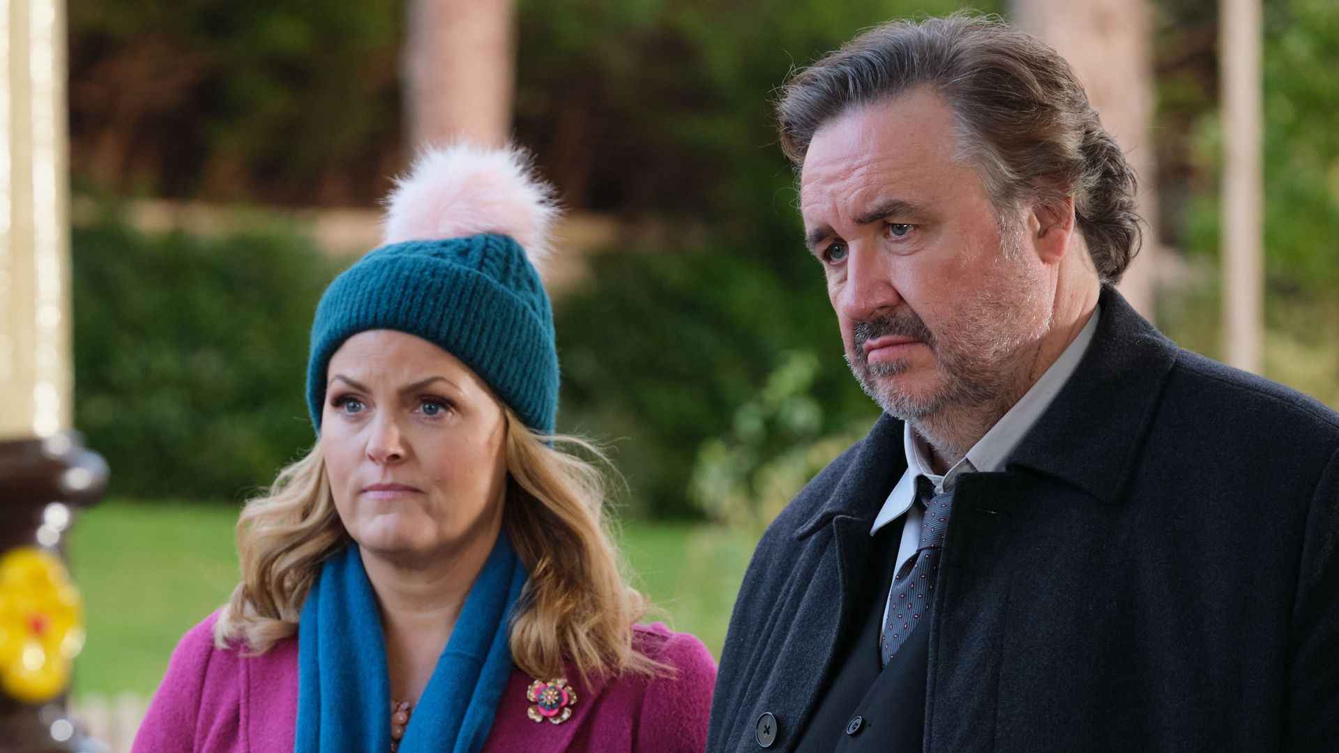 woman and man standing outdoors