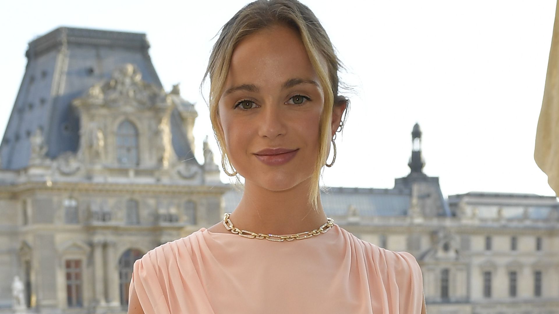 Prince Harry’s cousin Lady Amelia Windsor’s bold leg-split wedding guest dress is a kaleidoscope of colour