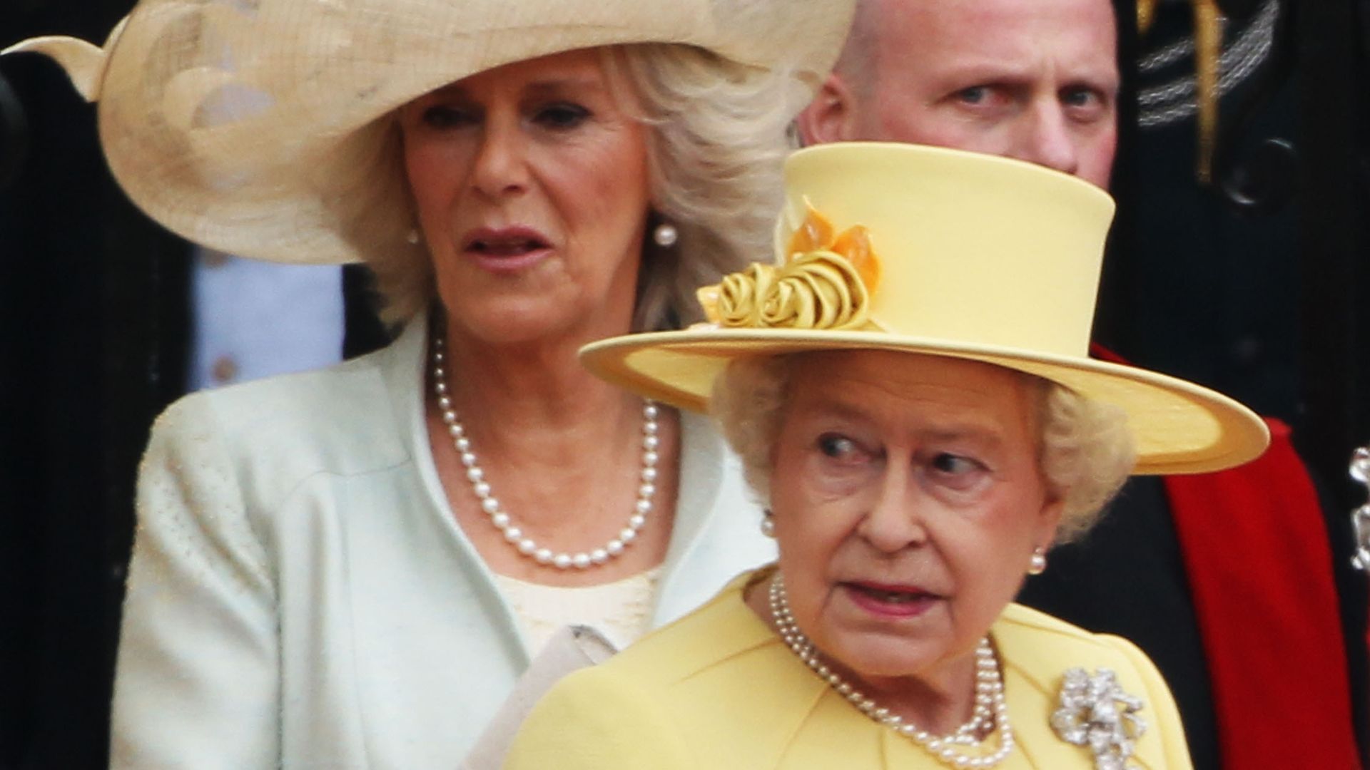 queen in yellow at royal wedding