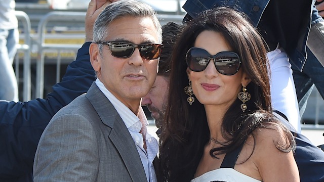 George Clooney and Amal Alamuddin arrive in Venice on September 26, 2014 in Venice, Italy. George Clooney is set to marry his lawyer fiancee Amal Alamuddin this weekend in Venice where they met.  (Photo by PVS/GC Images)