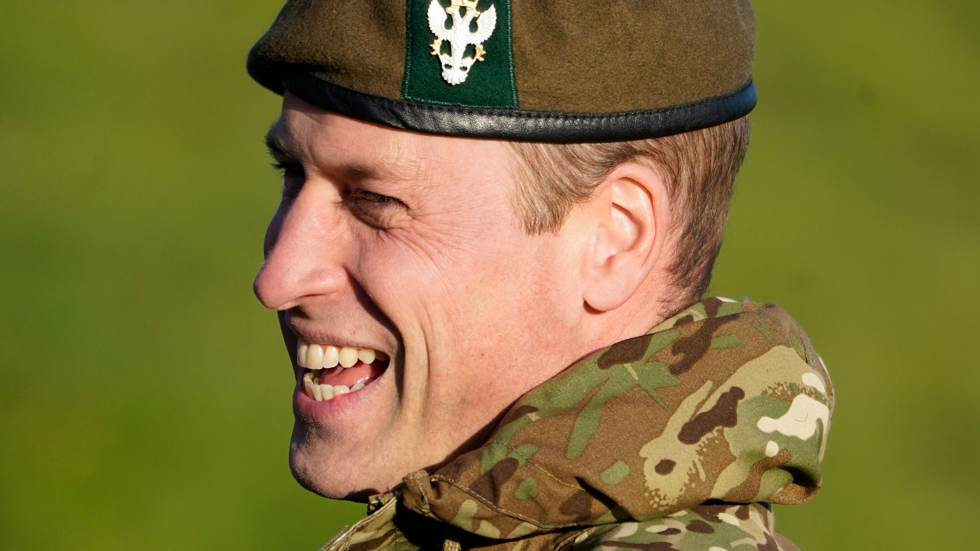 Prince William laughing in army clothes