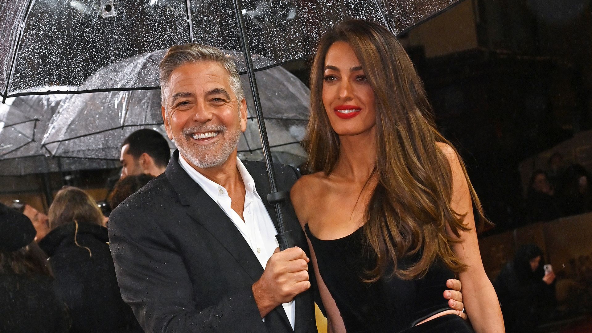 George Clooney and Amal Clooney attend a special screening of "The Boys In The Boat" at The Curzon Mayfair on December 3, 2023 in London, England