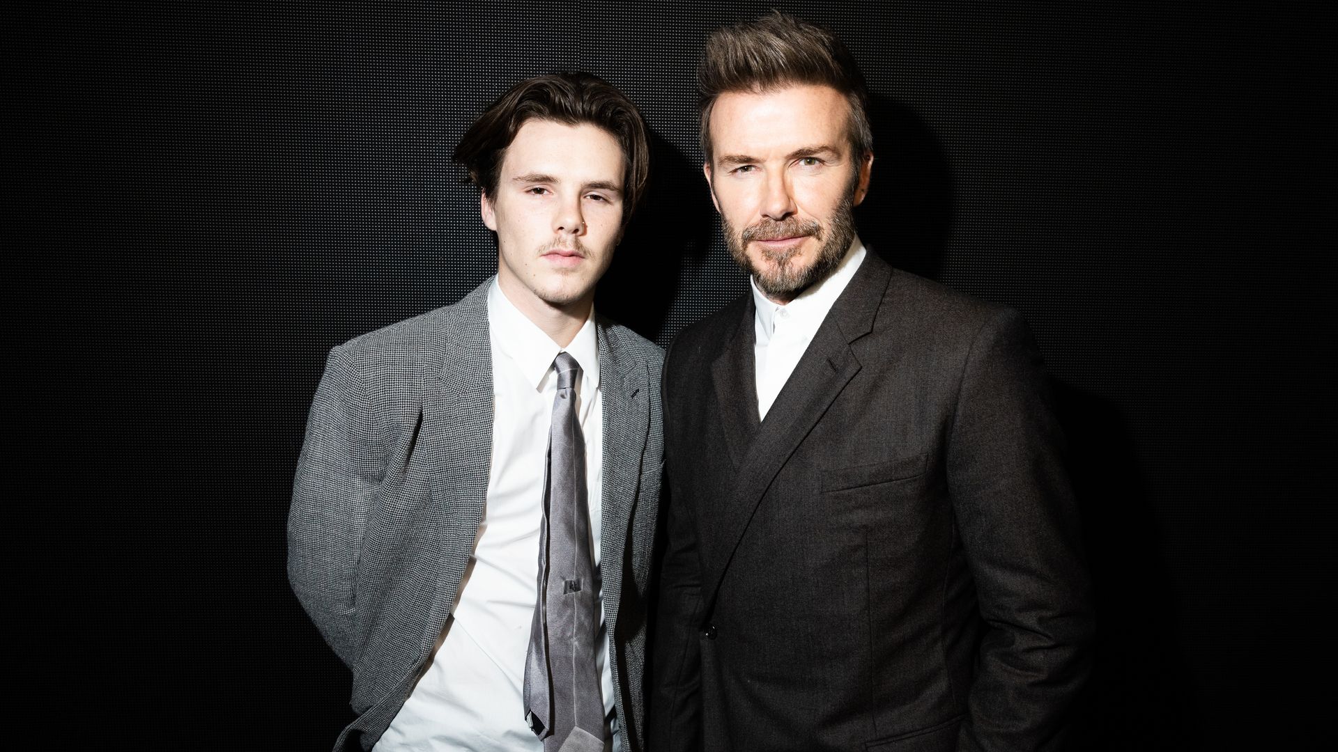 cruz and david beckham in suits