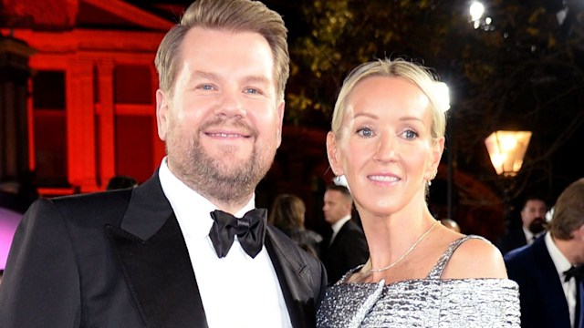 James Corden in a tuxe and wife Julia in a silver off-the-shoulder gown on the red carpet