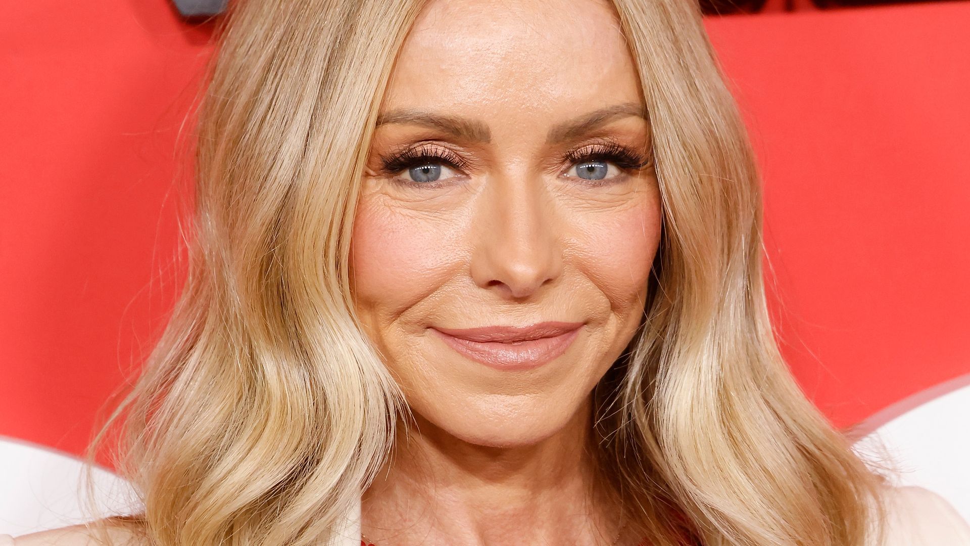 Kelly Ripa's musician daughter Lola looks so sunkissed during rare red carpet moment with famous parents