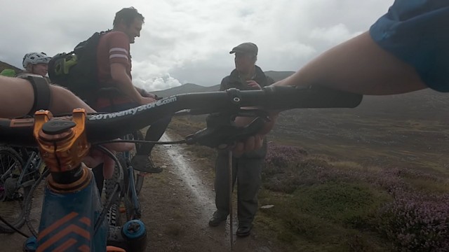 King Charles meeting cyclists on solo walk in Balmoral