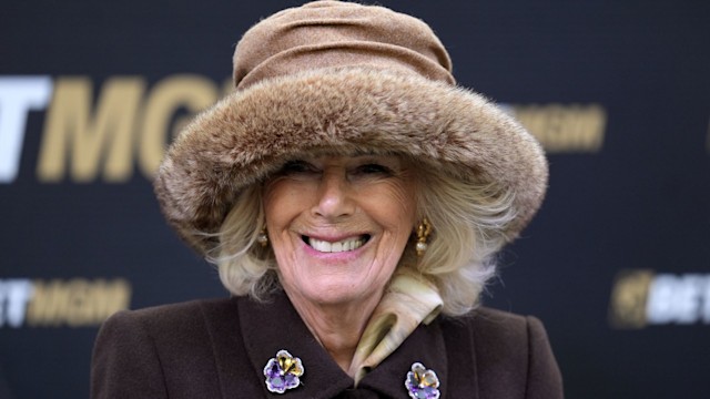 Queen Camilla before presenting the trophies for the winners of the BetMGM Queen Mother Champion Chase on day two of the 2025 Cheltenham Festival at Cheltenham Racecourse.