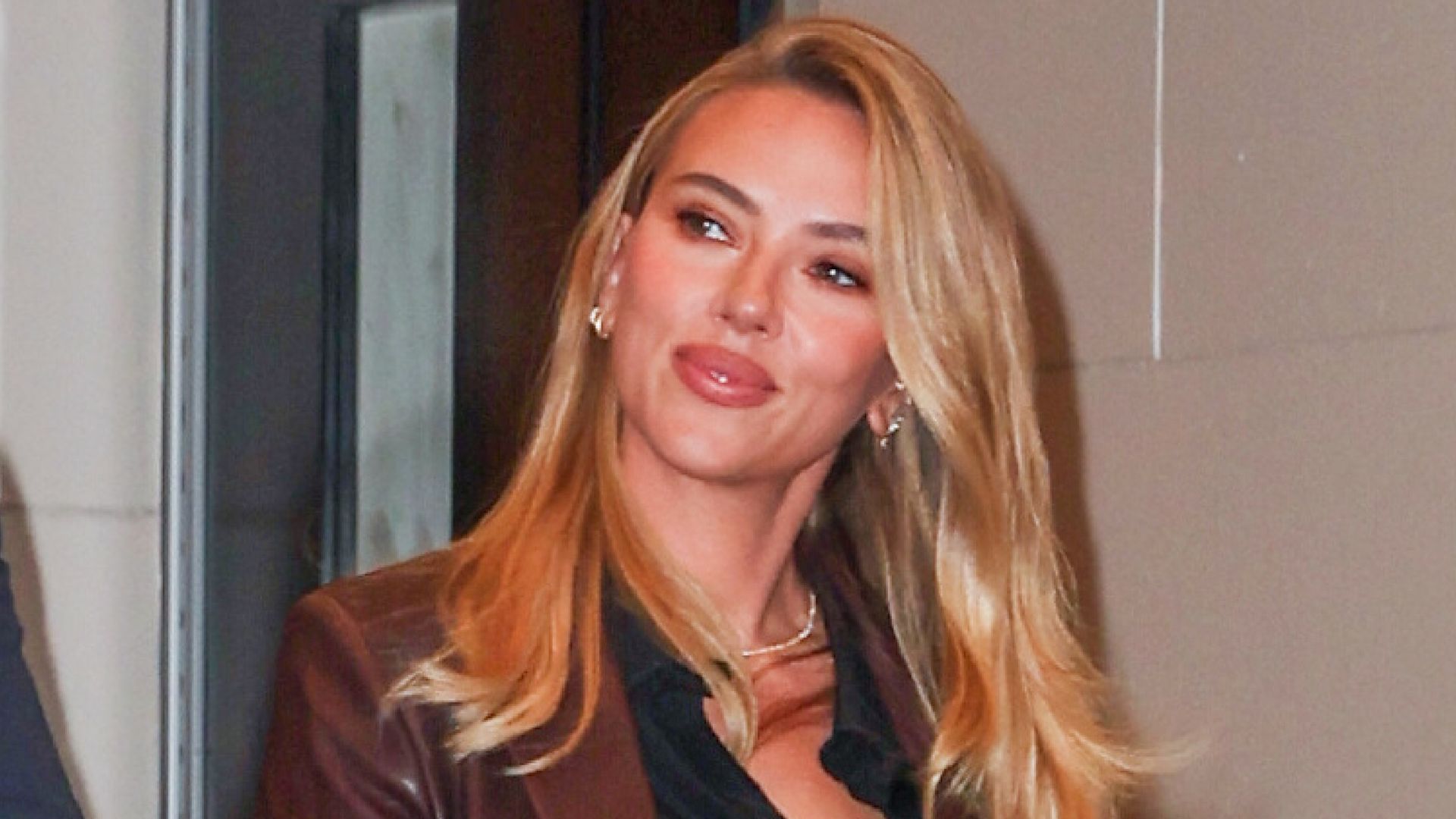 Scarlett Johansson wearing a Dune black clutch bag while out in new york