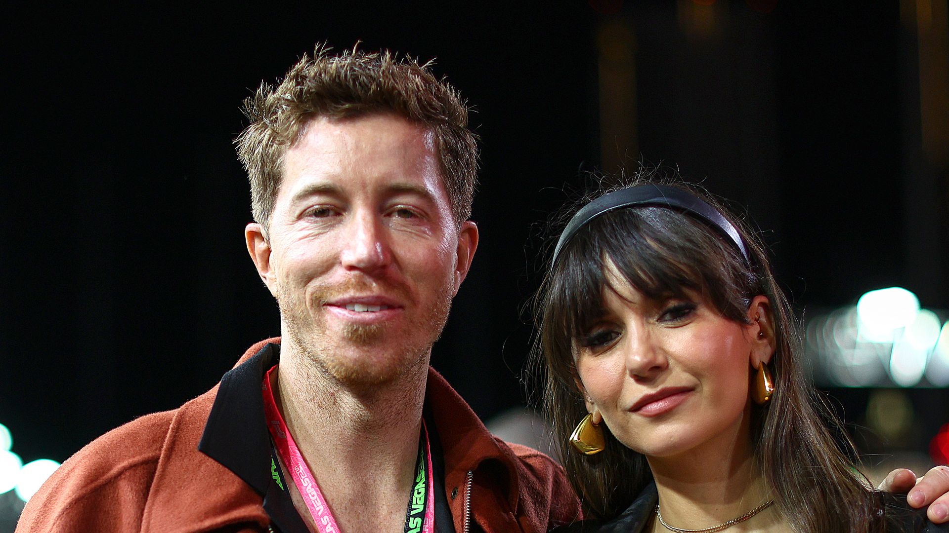 Shaun White and Nina Dobrev walk on the grid prior to the F1 Grand Prix of Las Vegas at Las Vegas Strip Circuit on November 23, 2024 in Las Vegas, Nevada
