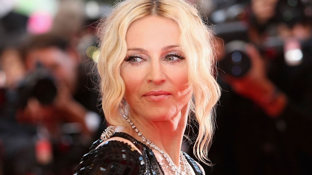 Madonna Posts Topless Selfie With Louis Vuitton Handbag