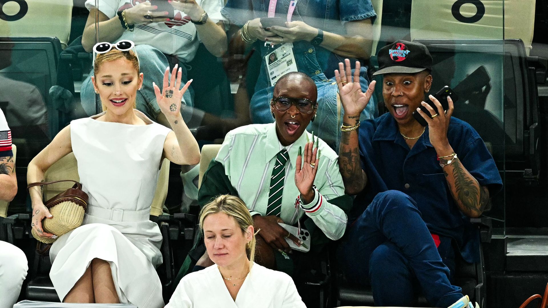 US singer Ariana Grande (L) and British actress and singer Cynthia Erivo (R) attend the artistic gymnastics women's qualification during the Paris 2024 Olympic Games at the Bercy Arena in Paris, on July 28, 2024.