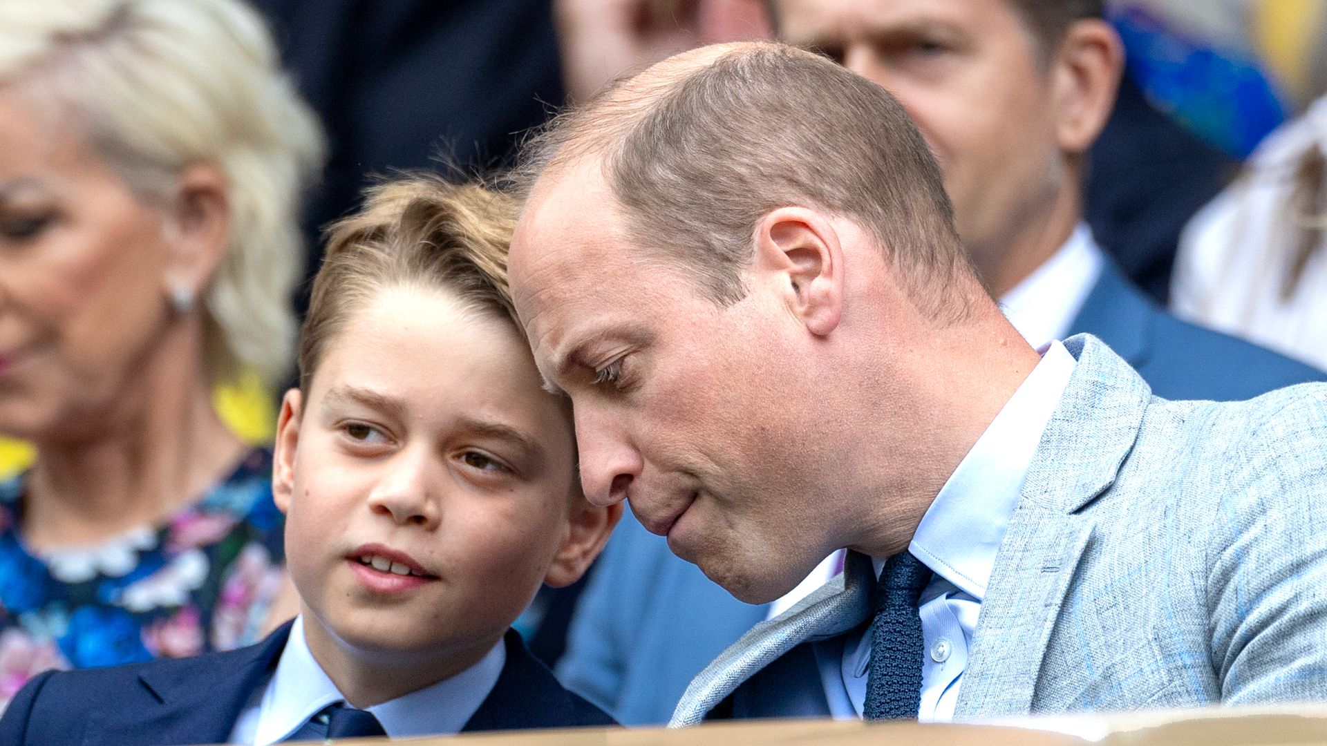 Prince George speaking to Prince William at Wimbledon 2023