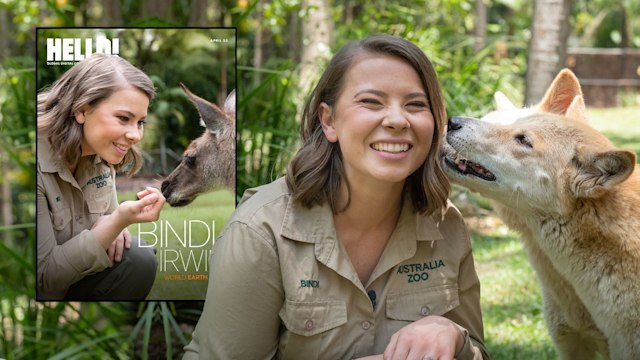 Bindi Irwin smiles as she poses with an animal at Australia Zoo