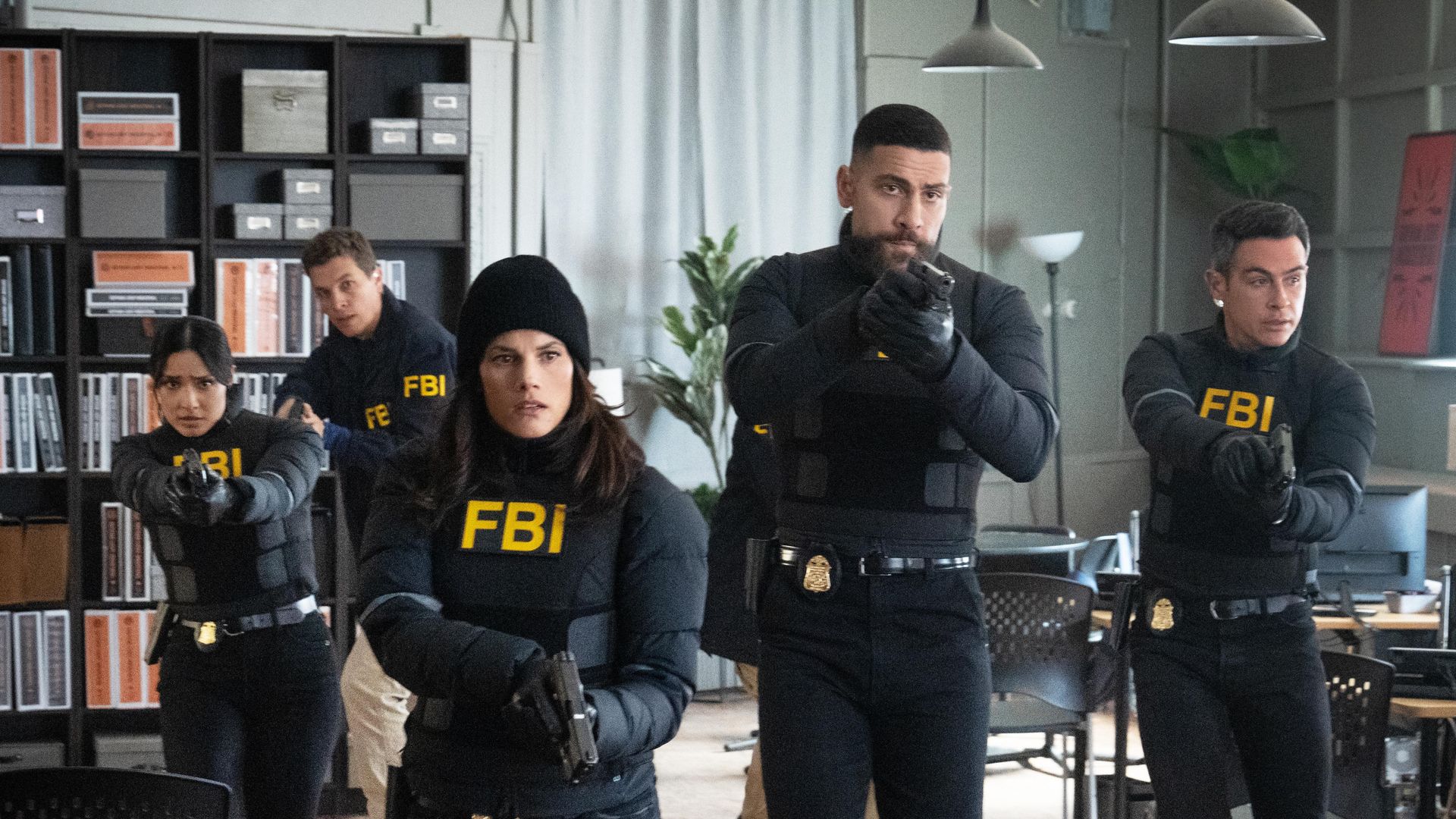 Emily Alabi as Dani Rhodes, Unknown, Missy Peregrym as Special Agent Maggie Bell, Zeeko Zaki as Special Agent Omar Adom 'OA' Zidan, and John Boyd as Special Agent Stuart Scola on FBI