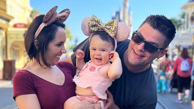 Janette Manrara, Aljaz Skorjanec and Lyra smile for photo at Disneyland