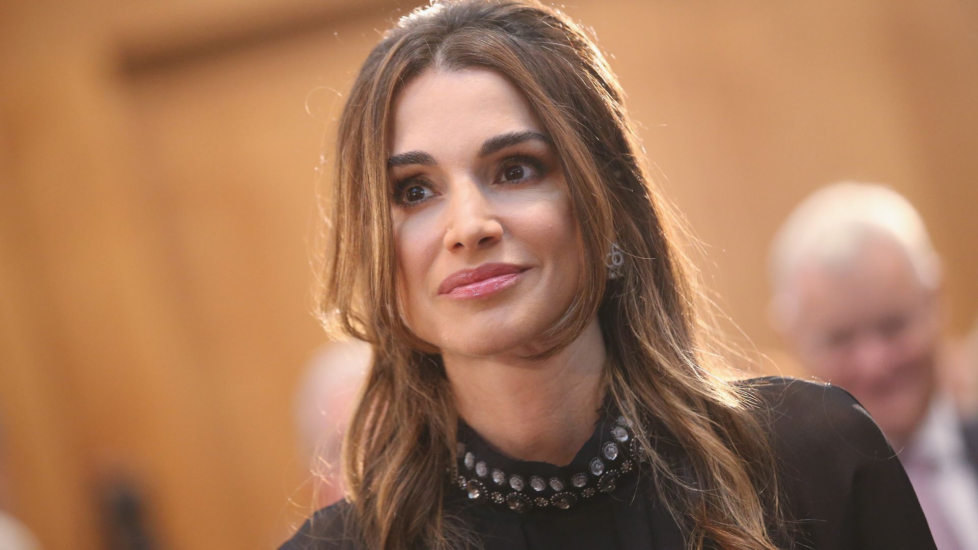 Queen Rania goes ultra-casual for hands-on grandmother moment captured on camera