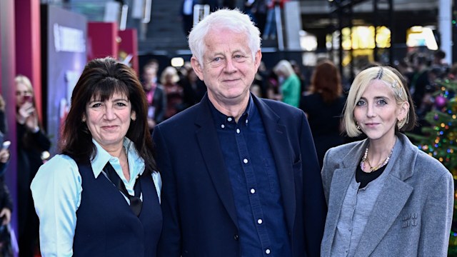 Richard Curtis standing with Emma freud and Scarlett Curtis