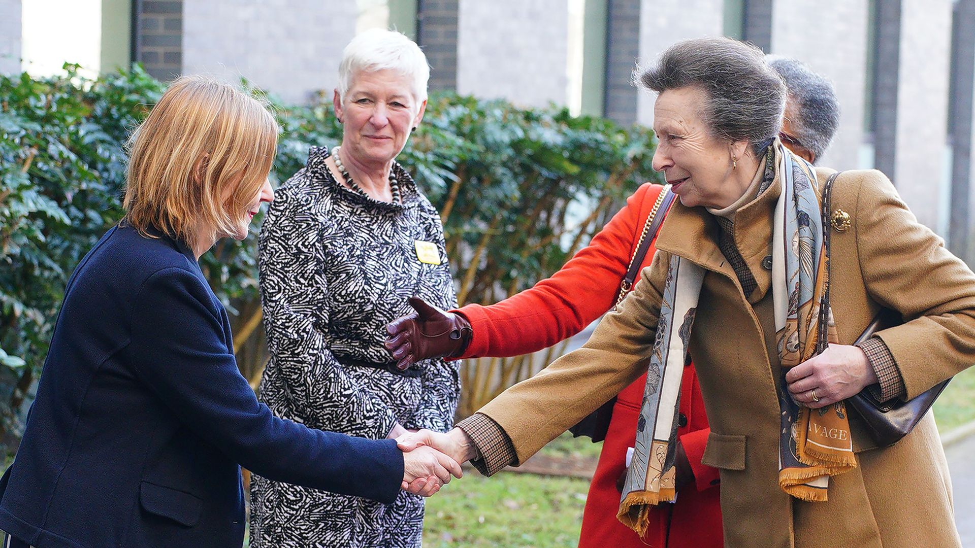 Princess Anne shaking hands with Maria Kane at Southmead Hospital