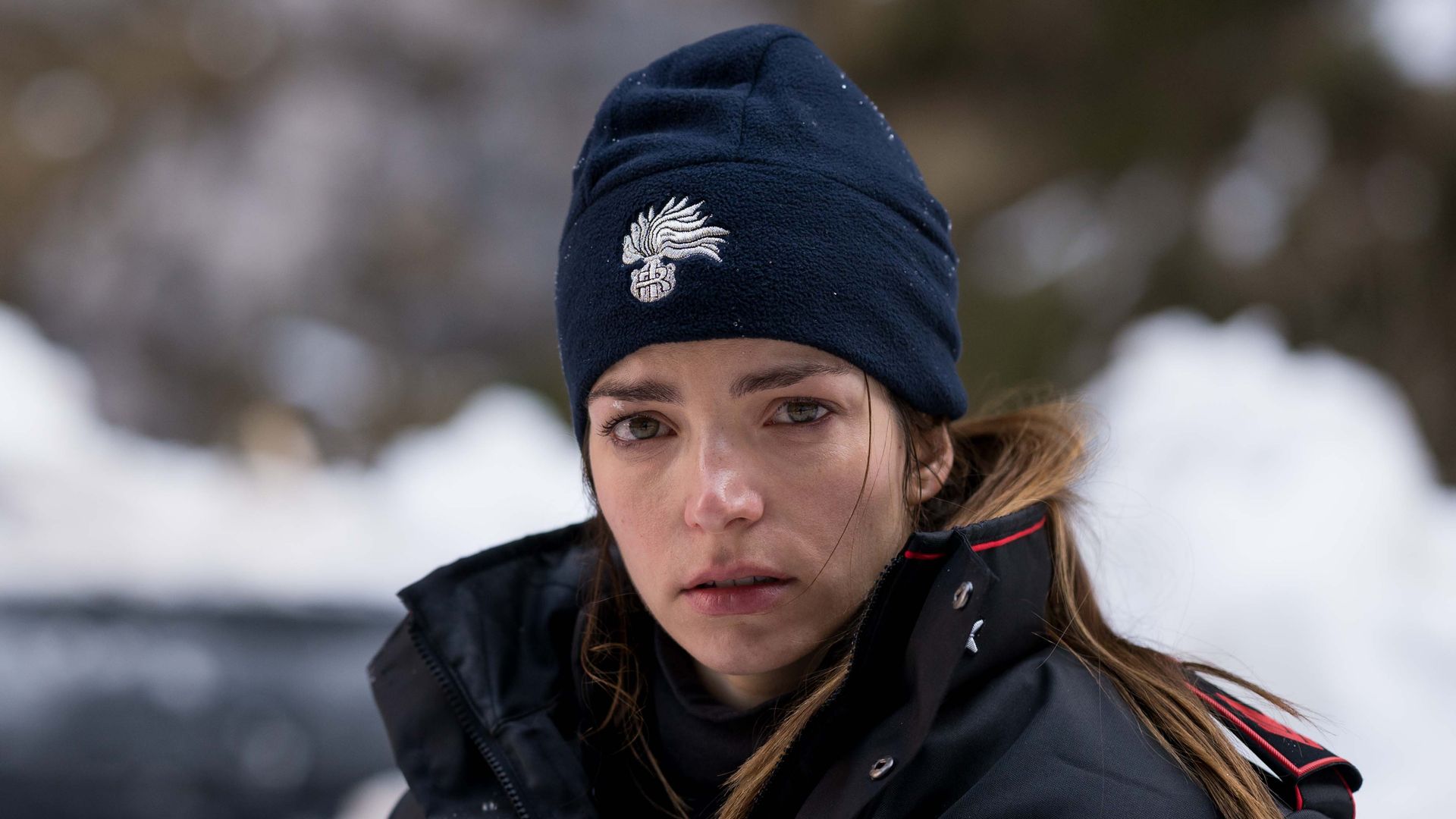 close-up woman in snowy outdoors