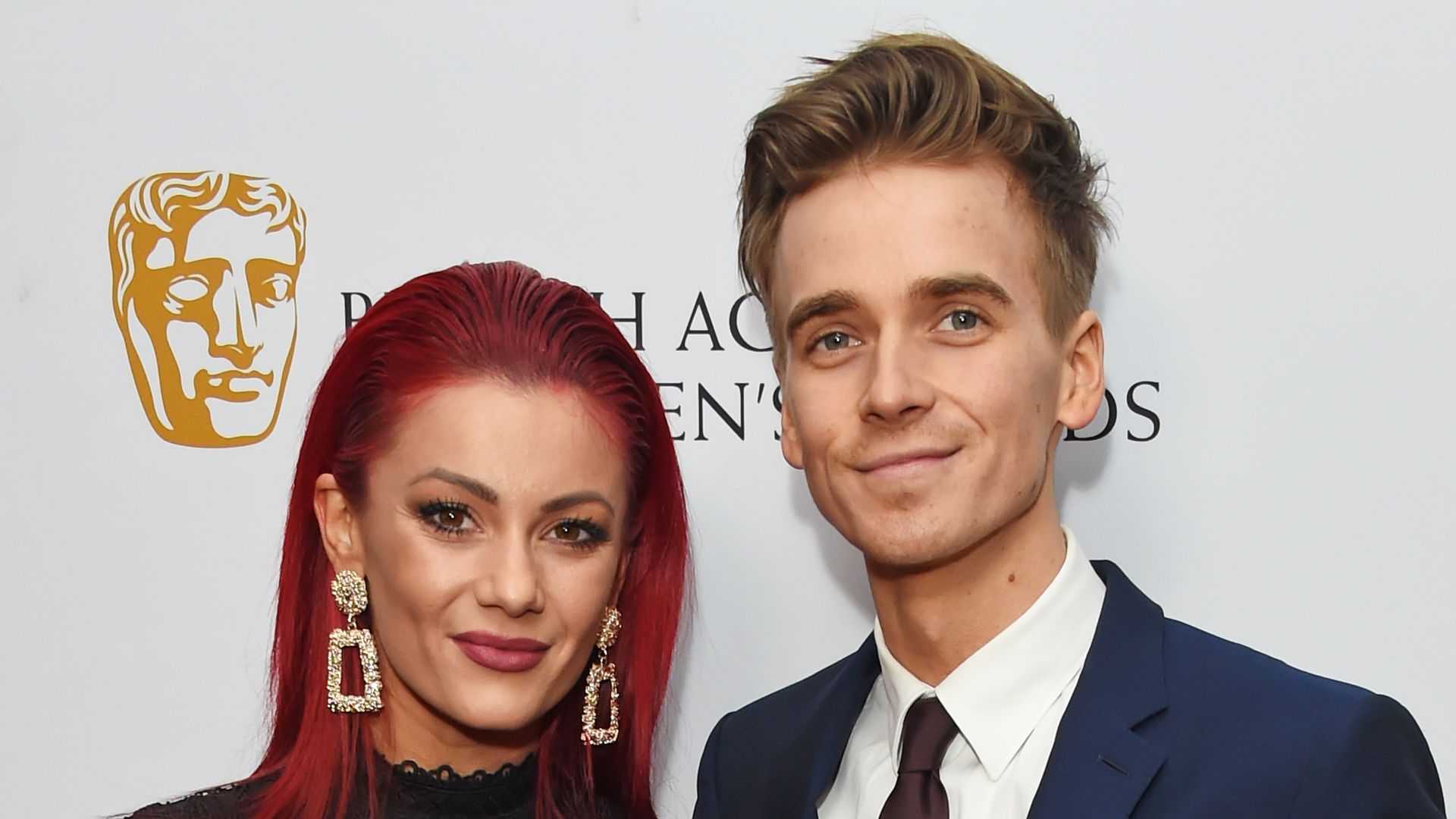 Dianne Buswell with Joe Sugg on the red carpet 