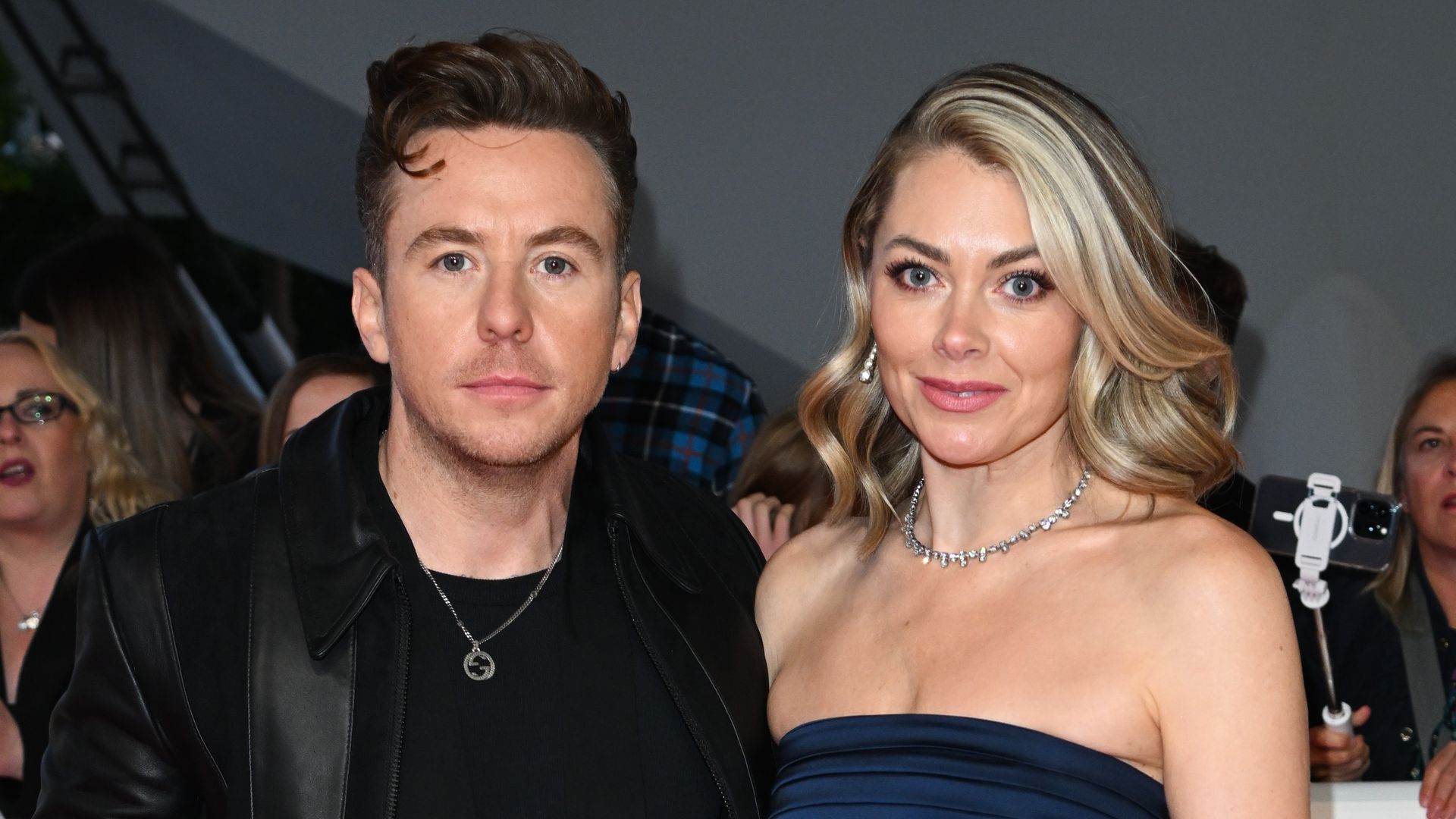 Danny Jones and Georgia posing for photos on red carpet of NTAs