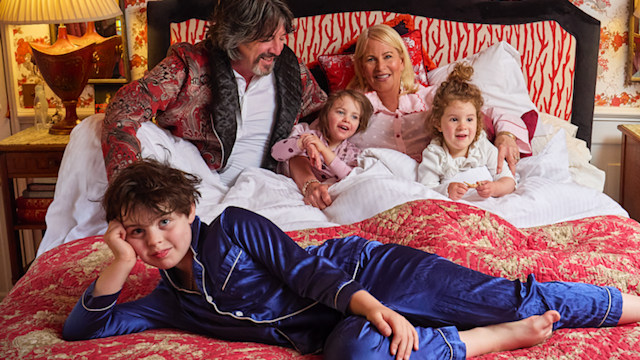 family on large bed