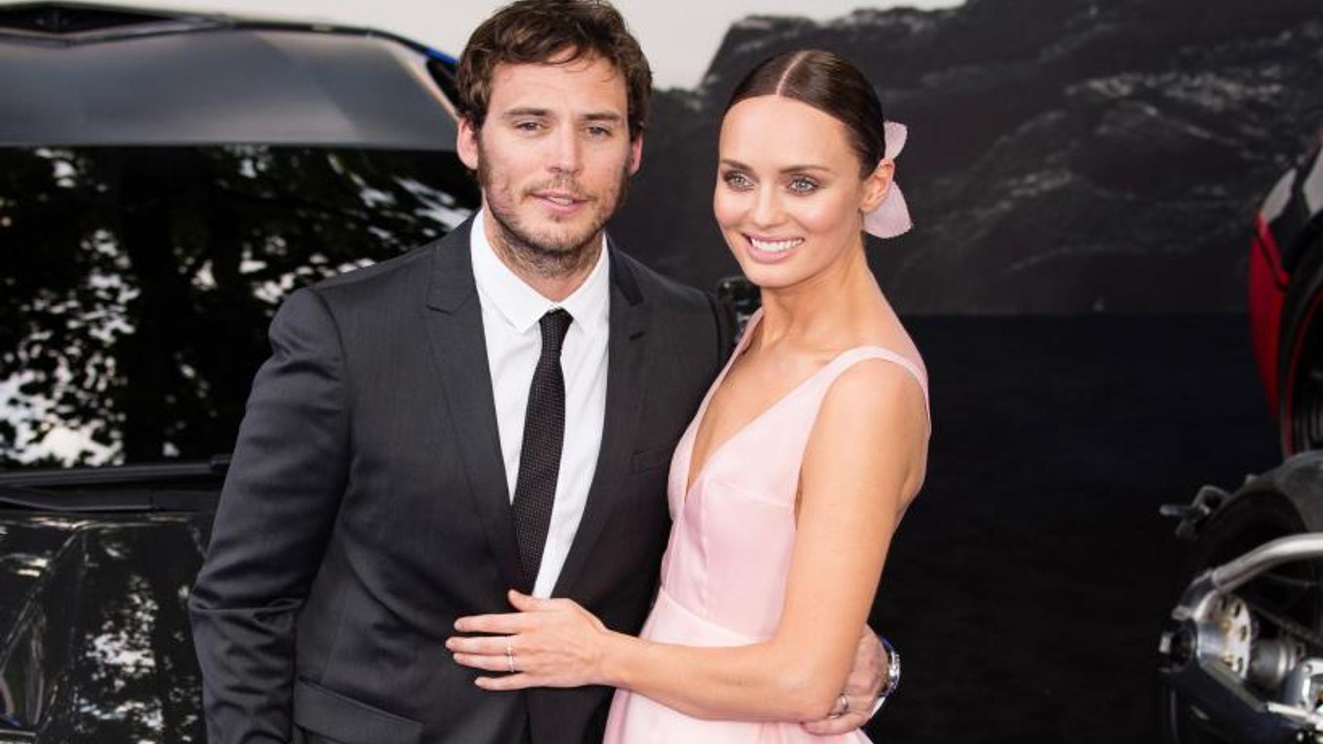 sam claflin at transformers premiere with wife laura haddock