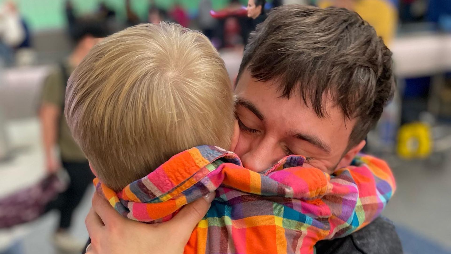 Tom Daley's heartwarming reunion with mini-me son Robbie leaves fans in tears - watch