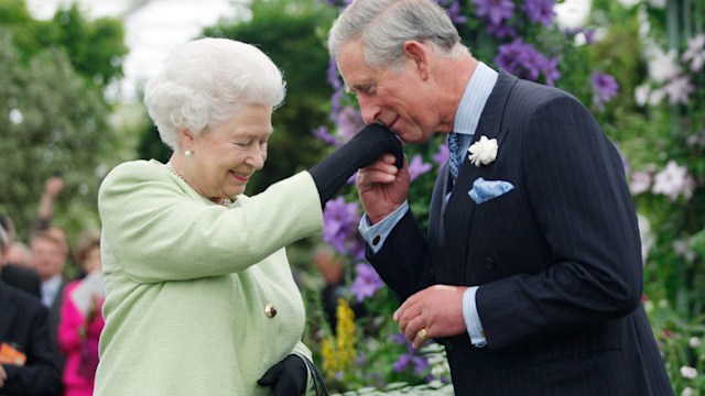 Charles kisses his mother's hand affectionately at the Chelsea Flower Show